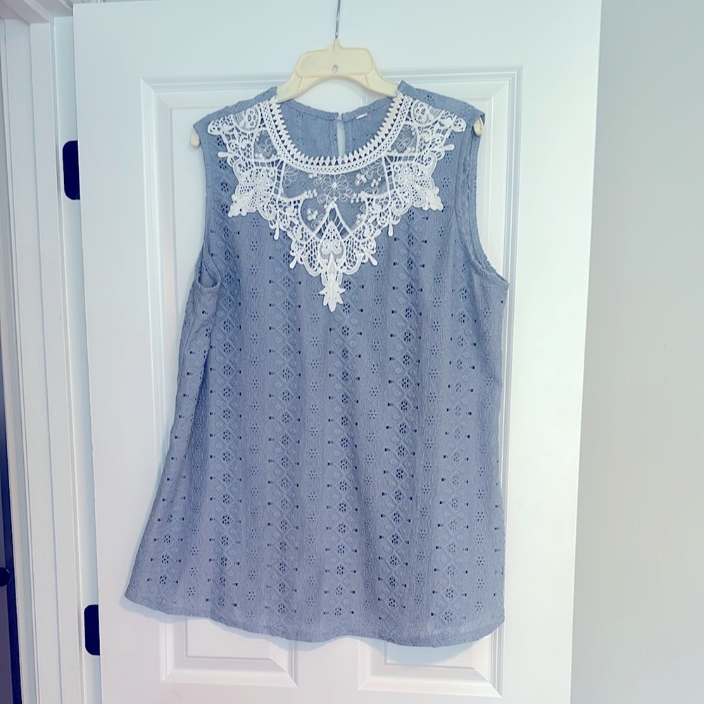 Blue and white sleeveless top